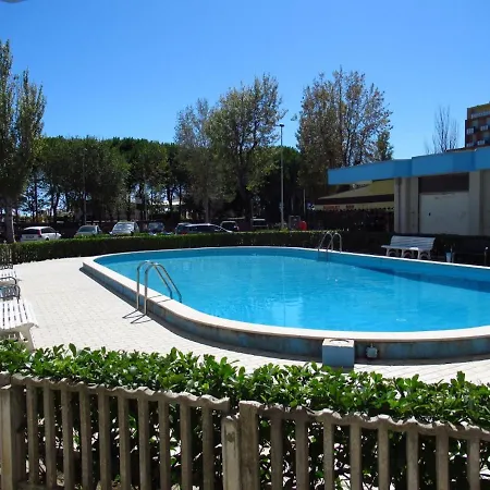 With Shared Pool And Balcony